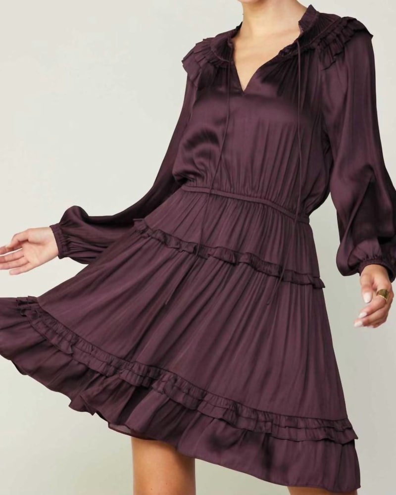 Front of a model wearing a size L Long Sleeve Split Neck Tiered Mini Dress In Midnight Plum in Midnight Plum by current air. | dia_product_style_image_id:359503